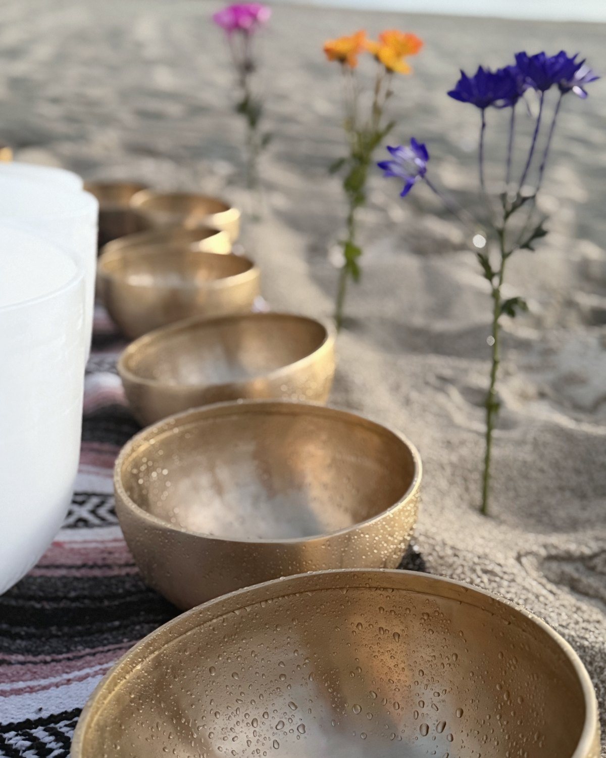Tibetan bowls and a candle on the table